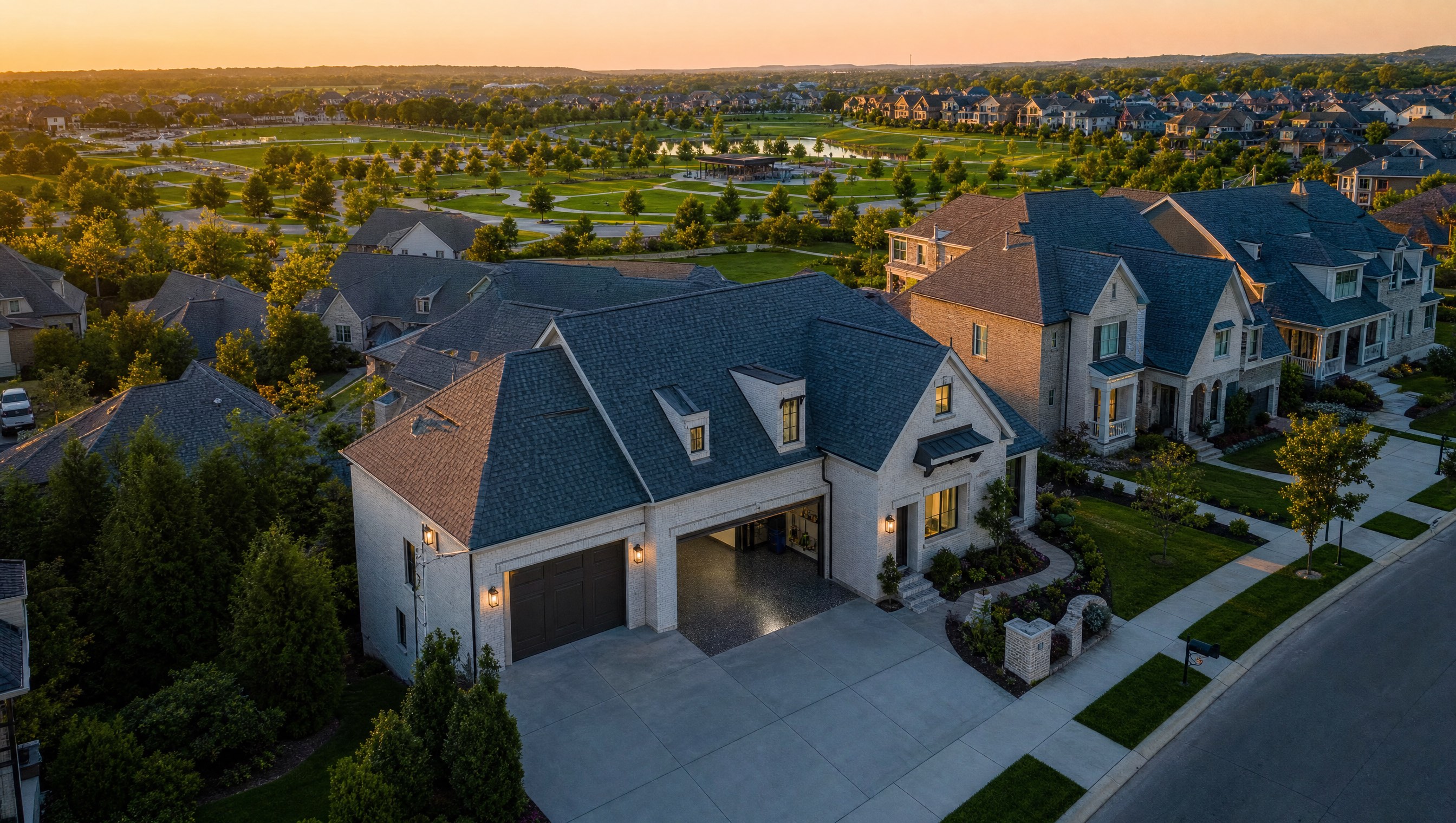 Aerial view of Franklin Tennessee Westhaven planned community luxury home with epoxy garage floor at golden hour